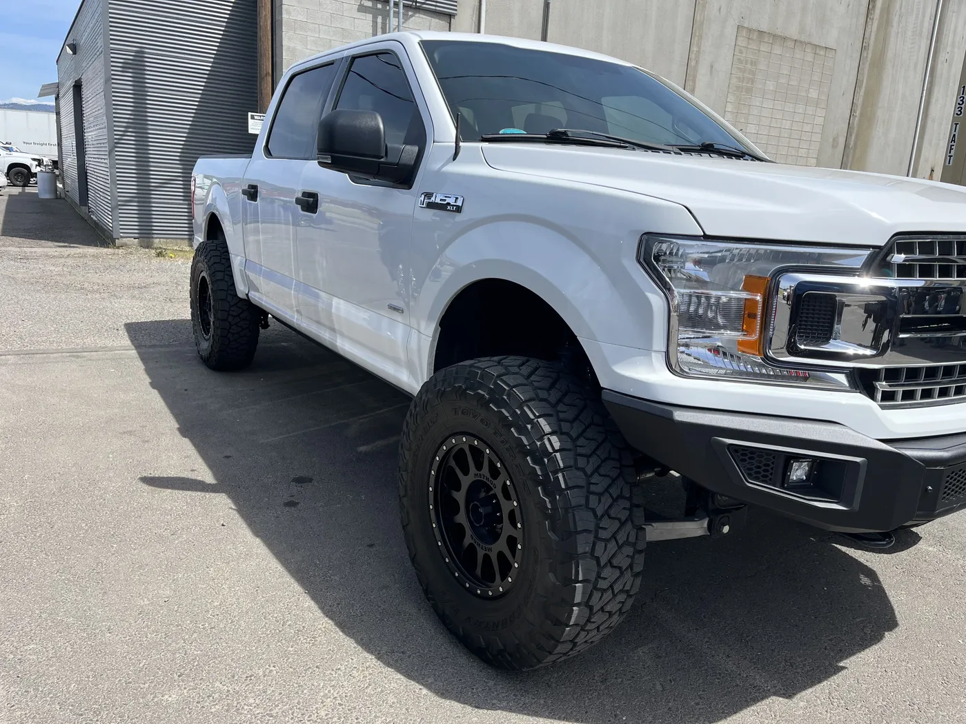 Lifted off-road truck representing BD Fabrication services